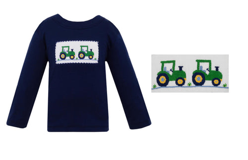 Get your little farmer ready in this TRACTOR-Solid Navy blue knit T-shirt. The smocked detail adds style, while the tractor motif brings a playful touch. Perfect for all-day play and easy to mix and match. A must-have for any young tractor lover.