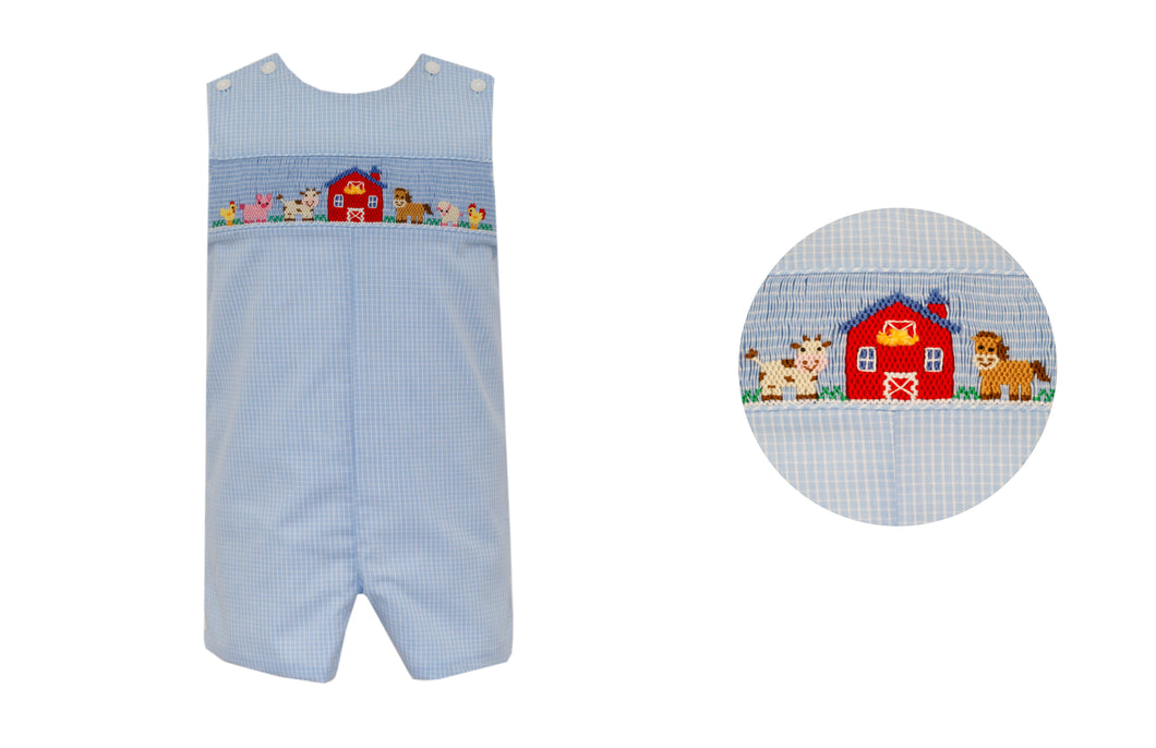 Get your little boy ready for all sorts of fun with this adorable Farm Blue Check Jon Jon. With its timeless checkered pattern and cute farm smocking design, this is perfect for your toddler for everything from pumpkin patch visits to family football games. Comfortable and stylish for any occasion!