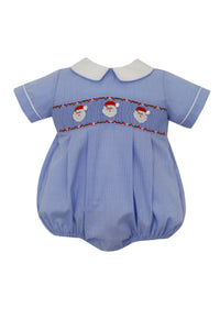 Introducing the Blue Check Santa Bubble for infant boys from Petit Bebe. Made with soft and durable fabric, this bubbly outfit is designed to keep your little one comfortable all day long. The festive blue check pattern and cute Santa embroidery and smocked detail will add an adorable touch to your baby's holiday wardrobe.