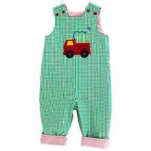 Load image into Gallery viewer, Get your little one ready for the holidays with our Boys Reversible Santa-Train Jon Jon. Featuring a festive Santa applique on one side and a cool Fire Truck design on the other, this versatile outfit is perfect for Christmas and beyond. Made with a cozy heathered fabric in red and green, it&#39;s sure to keep your toddler comfortable all day long.
