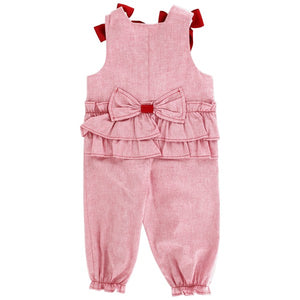 Dress your little one in festive style with our Girls Tie Shoulder Santa Long Romper. This adorable heathered red romper features a cute Santa applique and classic shoulder ties. The back accent includes a bow and ruffles for an extra touch of charm. Match with our toddler boys Santa Jon Jon for a coordinated holiday look. From Bailey Boys.