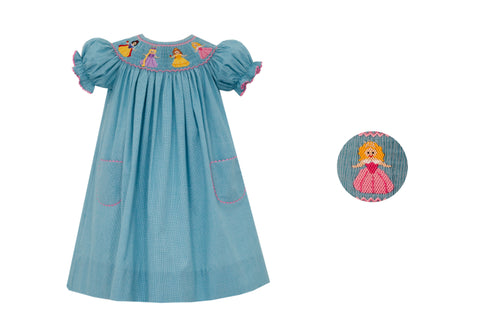 Elevate your little princess' wardrobe with our stunning Princess Bishop dress. With its intricate checkered design and delicate smocking detail, this dress is perfect for any special occasion. The microcheck pattern in turquoise adds a touch of playfulness to this timeless piece. Give your toddler girl a look that is both stylish and sweet.