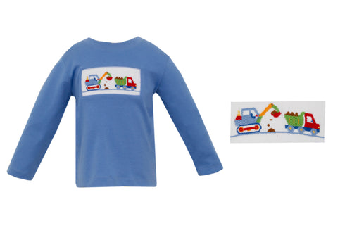 Toddler Boys Knit Long Sleeve Smocked T-shirt in blue! Featuring a fun and playful construction motif, this shirt will keep your child looking cool while staying cozy all day long. Perfect for any adventure!