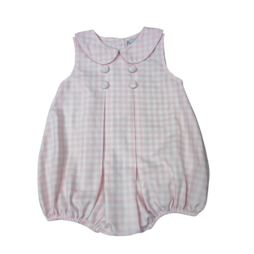 Elevate your toddler girl's wardrobe with our charming Pink Check Pleat Collar Bubble from Delaney. Sweet pleats, delicate peter pan collar, and soft pink and white gingham pattern make it a perfect addition to any occasion. Classic, yet stylish, it's a must-have for your little one! Matching sister dress and short set!