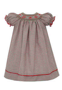 Dress your little one in holiday charm with our Red &amp; Green Gingham Bishop Dress from Anavini. With a smocked collar, short sleeves, and timeless style, this dress is perfect for the season. Get the classic look you love while keeping your toddler comfortable and stylish.