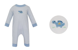 Looking for the perfect everyday outfit for your little dino-loving boy? Look no further than our Blue Gingham Dinosaur Long Romper! With its adorable blue gingham pattern and cute dinosaur applique, it's sure to be a hit with your little one. Comfortable and stylish, it's the ideal choice for any day.