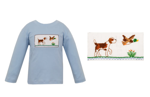 Introduce your little one to the wonders of nature with our Mallard Hunting Long Sleeve Knit T-Shirt. Made for boys, this light blue shirt features smocking details and classic mallard ducks, perfect for any wildlife enthusiast. Comfortable and stylish, it's the perfect choice for a day of outdoor play.