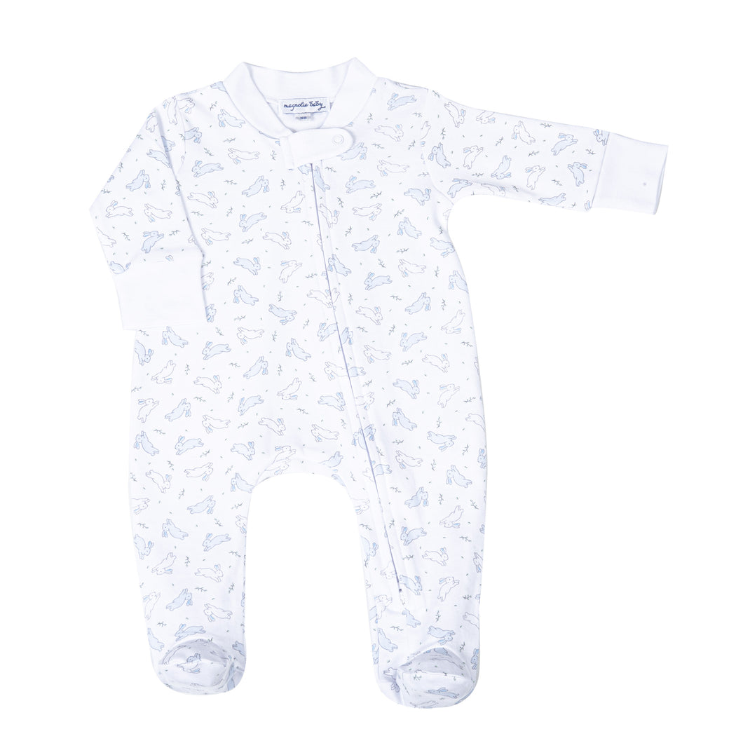 Get ready to hop into cuteness with our Bunny Hop Blue Zipper Footie from Magnolia Baby! This adorable footie features blue and white bunnies hopping all over, while the 2 way zipper makes diaper changes a breeze. Keep your little one cozy and stylish in this must-have piece.