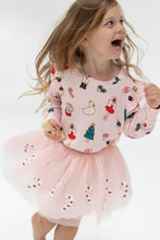 Load image into Gallery viewer, Dress your little one in the Candy Cane Twirl Tutu from Angel Dear for a whimsical and fun look. The pink tutu features sequin candy canes, and pairs perfectly with the Nutcracker Sweatshirt for a playful outfit. Perfect for any holiday celebration or everyday playtime.
