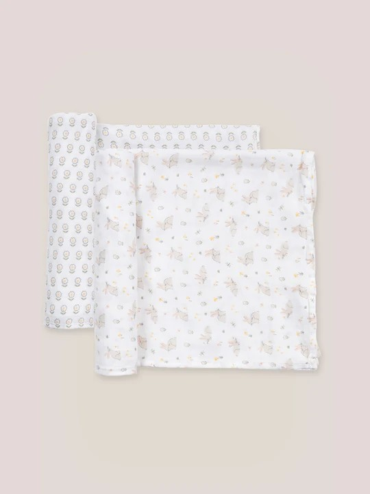 The Swaddle Blanket Set from JuJuBe × Studio Oh! includes two blankets, each with an irresistible, on-trend design. While perfect for swaddling newborns, these blankets can also be used for tummy time, as lightweight stroller covers, and as nursing throws. Each measures 44 by 44 inches (112 cm × 112 cm) and is made of sustainable, non-GMO bamboo fabric that is gentle on Baby’s skin and is soft, cozy, and breathable. Designed with sweet artwork in nursery-friendly colors, these blankets come packaged in a gi