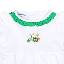 Load image into Gallery viewer, Looking for the perfect outfit for your little one? Look no further! Our Tractor Time bubble features a charming embellished tractor appliqué and delicate green ruffle details around the collar. Made with soft, high-quality fabric, your baby will look and feel adorable in this cute and comfortable white ruffle bubble.
