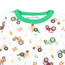 Load image into Gallery viewer, Looking for the perfect outfit for your little one? Look no further! Our Tractor Time bubble features a charming embellished tractor appliqué and delicate green ruffle details around the collar. Made with soft, high-quality fabric, your baby will look and feel adorable in this cute and comfortable white ruffle bubble.
