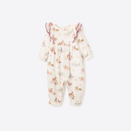 Wrap your little one in whimsical woodland charm with the Infant Girl's Organic Muslin Forest Family Printed Ruffle Jumpsuit. Featuring sweet woodland characters and delicate ruffle details, this soft, breathable jumpsuit is perfect for cozy playtime and outings. Ideal for adding a touch of nature-inspired magic to your baby's wardrobe.