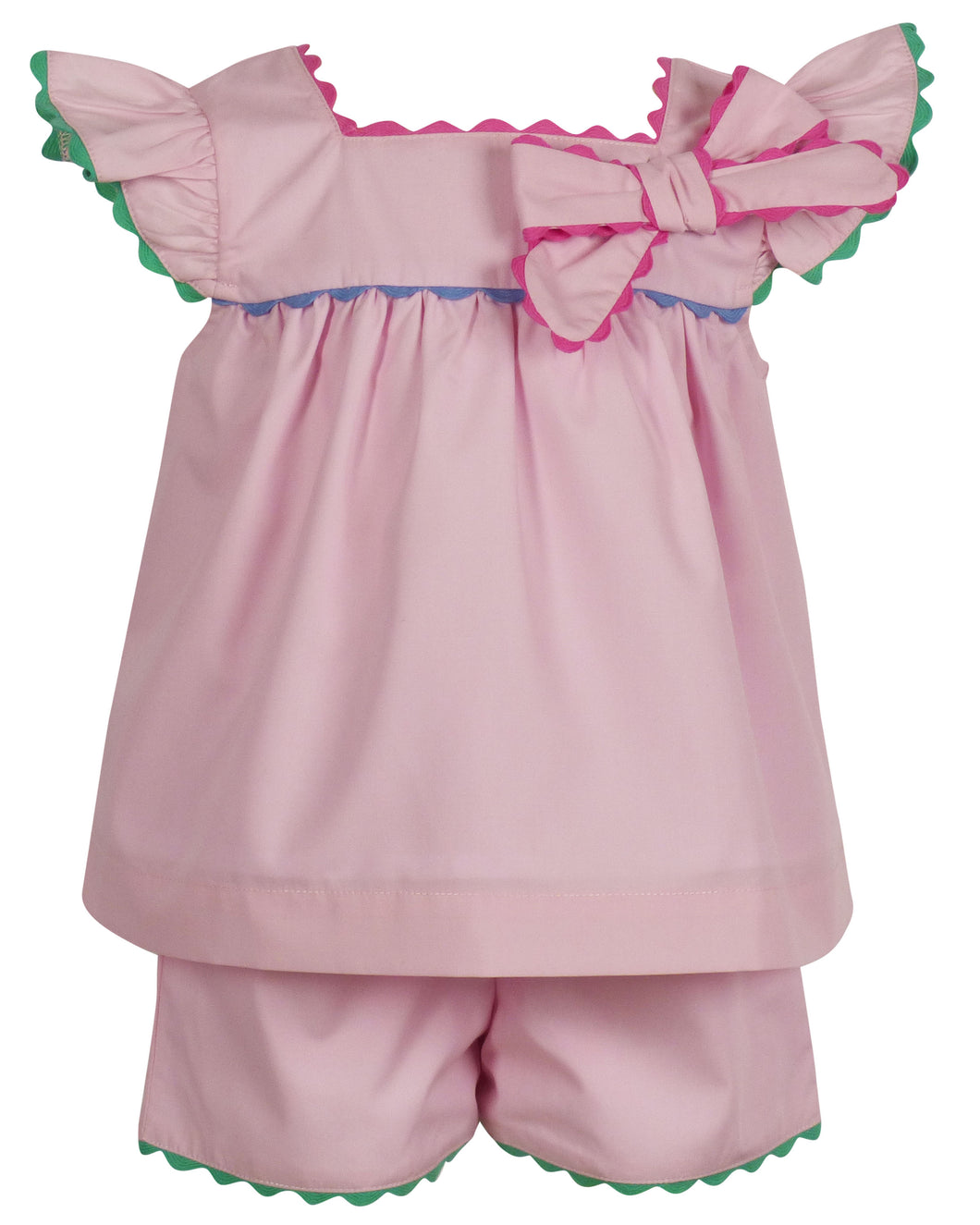 Introducing the Annie Bow Pantaloon Set from The Yellow Lamb, a must-have for infant & toddler girls. This light pink set features a beautiful bow on one shoulder with colorful ric rac detail. Dress up your little one in style and complete the look for sisters with the matching dress for toddler and big girls.