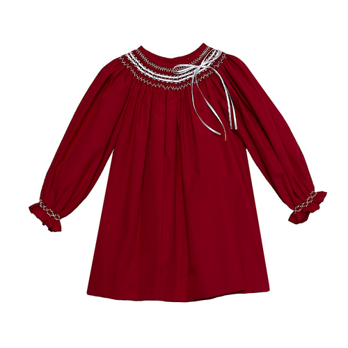 Get your little one ready for the holiday season with our Classic Ribbon Red Dress from Zuccini Kids. Made from soft and comfortable Broadcloth, this dress features a timeless, charming ribbon and smocking detail. Perfect for any festive occasion, your little girl will look adorable and festive in this classic Christmas attire.