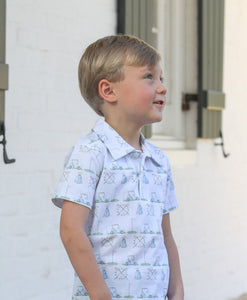 The Hole in One Boys Polo from Trotter Street Kids is a must-have for any budding golf enthusiast. This classic golf polo features an adorable golf print and a stylish polo collar, making it perfect for outings to the country club. Get your little one ready for the green in style!
