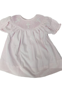 Get ready for Easter Sunday or any religious event with the Crissy Cross Dress for toddler girls from Shop Teeta! This stunning dress features pink and white pinstripes and a smocked collar adorned with white crosses. Look and feel your best with this elegant and versatile dress.