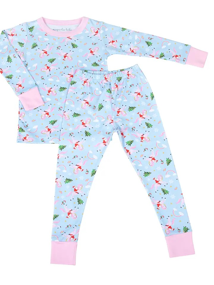 The Merry Unicorn Long Pajama Set is perfect for your little girl this Christmas. Made by Magnolia Baby, it features a cute unicorn design on a light blue long sleeve pajama set. Keep your toddler warm and cozy all night long.