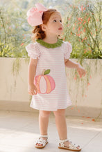 Load image into Gallery viewer, Dress your little one in this adorable Reagan Dress with Pumpkin Applique from Zuccini Kids! Made with soft pink and white striped knit, it features a cute green ruffle neckline and a large pumpkin pocket. Perfect for everyday wear, your toddler will love playing in it at school and beyond this fall.
