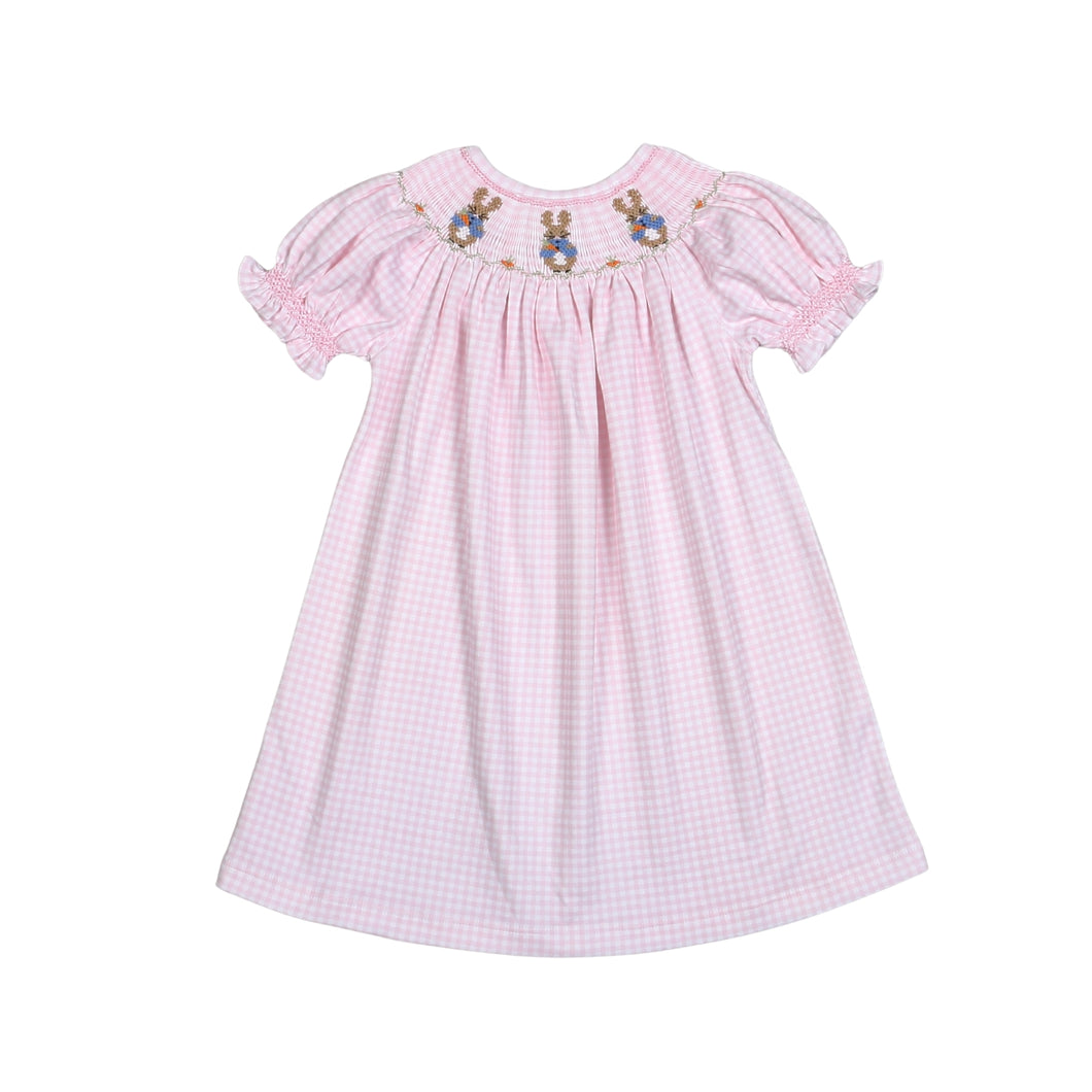 Dress your little one in comfort and style with the Pink Peter Rabbit Bishop Dress. Made from soft 100% pima cotton, this dress features a charming pink and white gingham print and a smocked bodice with adorable Peter Rabbits. The perfect choice for one of your toddler girl's Easter outfits.