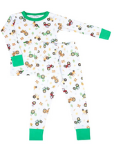 Load image into Gallery viewer, Looking for the perfect outfit for your little one? Look no further! Our Tractor Time bubble features a charming embellished tractor appliqué and delicate green ruffle details around the collar. Made with soft, high-quality fabric, your baby will look and feel adorable in this cute and comfortable white ruffle bubble.
