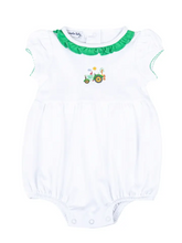 Load image into Gallery viewer, Looking for the perfect outfit for your little one? Look no further! Our Tractor Time bubble features a charming embellished tractor appliqué and delicate green ruffle details around the collar. Made with soft, high-quality fabric, your baby will look and feel adorable in this cute and comfortable white ruffle bubble.
