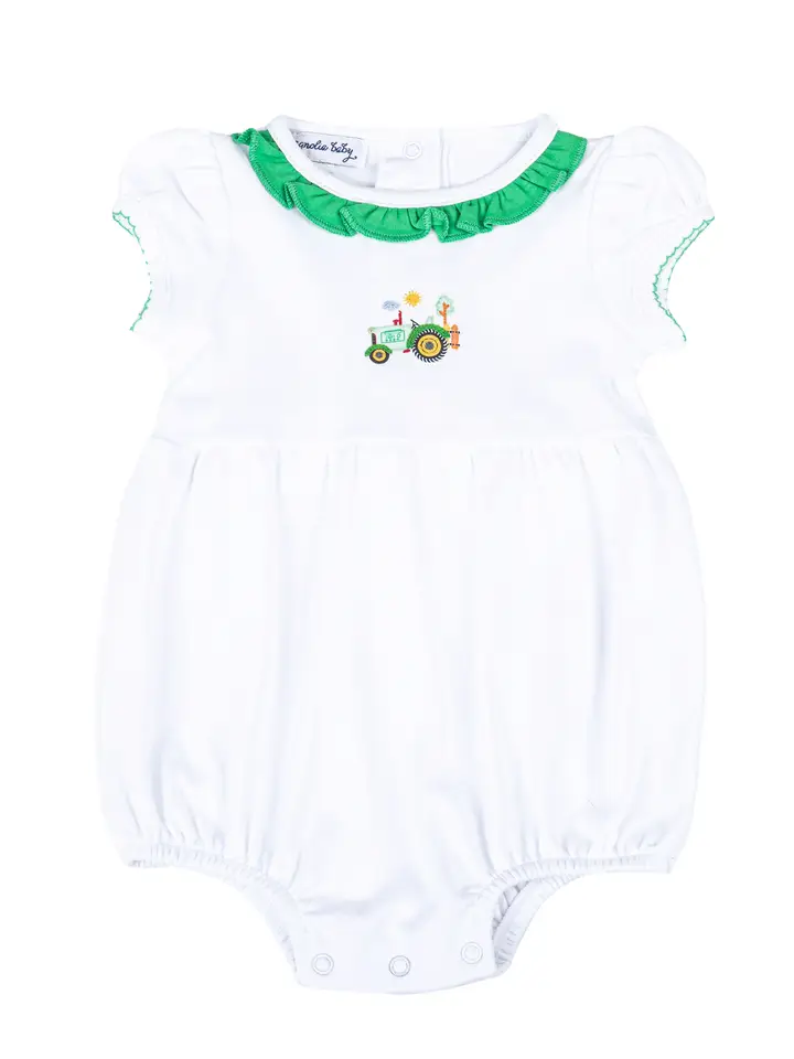 Looking for the perfect outfit for your little one? Look no further! Our Tractor Time bubble features a charming embellished tractor appliqué and delicate green ruffle details around the collar. Made with soft, high-quality fabric, your baby will look and feel adorable in this cute and comfortable white ruffle bubble.