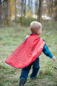 Every hero needs a cape! The Colour-A-Cape Spider Superhero is the perfect addition to your crime-fighter's wardrobe. Save the day or defeat monsters in the backyard with personalized style and flair! Includes 6 markers. This cape is also reversible with a red spider printed satin on the other side.