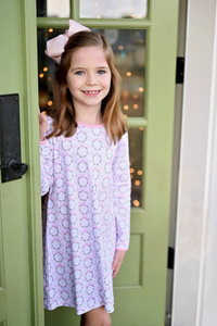 Get your little one ready for the holidays with The Rosie Knit Dress in Pink Wreaths from James &amp; Lottie. This adorable dress is a must-have for any toddler girl, perfect for festive gatherings and family photos. Made with soft and warm knit fabric, your little girl will stay comfortable and stylish all season long.